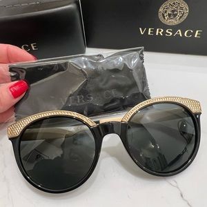 Perfect condition woman’s Versace sunglasses with box, case and cleaning cloth.